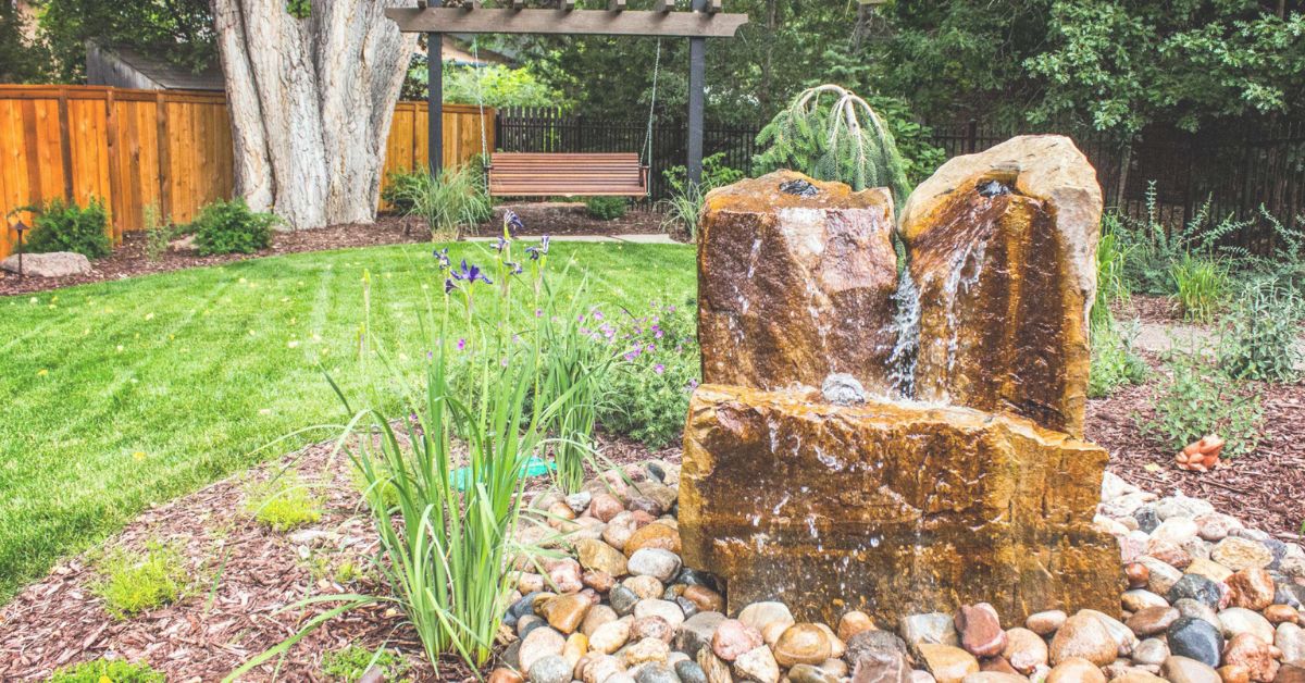 custom water feature made out of a boulder