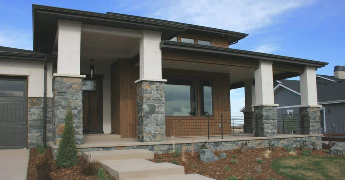 Home with natural stone veneer siding